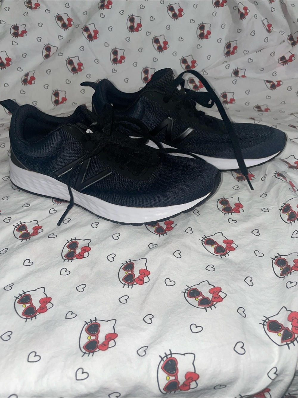 New Balance ladies Black Lace-Up Sneakers with White Sole